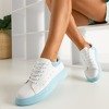 Жіноче біле спортивне взуття із синіми вставками Gulio - Взуття
