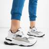 Жіноче біле спортивне взуття із тисненням на зміїній шкірі Feliks - Взуття