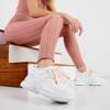 Жіноче біле спортивне взуття з рожевими вставками Adira - Взуття