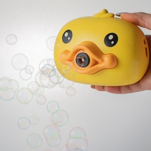 Жовта дитяча машинка у вигляді качечки для мильних бульбашок 3+
